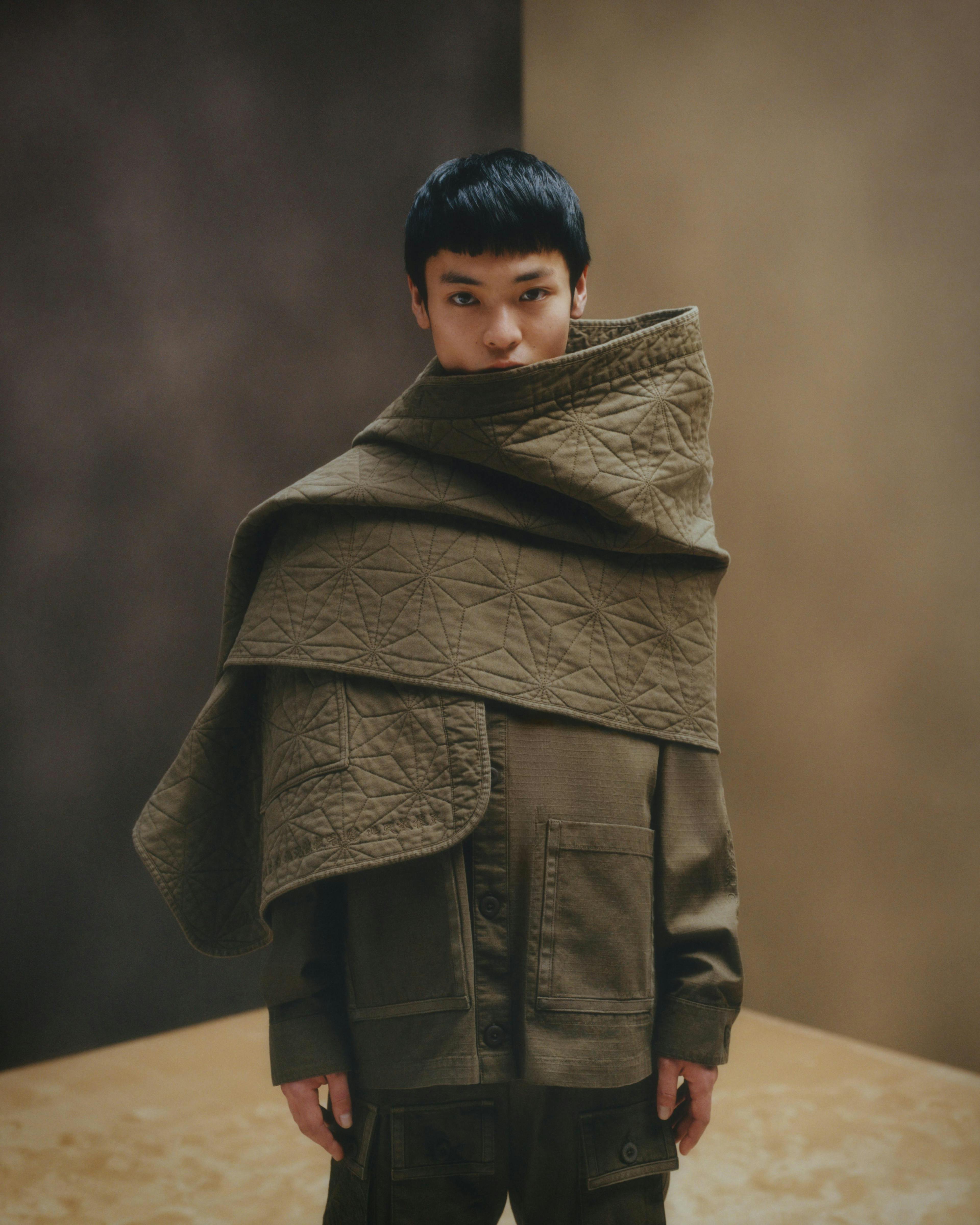 person fashion blanket clothing coat face head